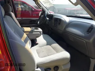 2003 Ford F-150 XLT with VIN 1FTRW07L13KD81923, listed as a IAAI auction lot 42112168 with 147,039 mi miles. Bid and sale history available at carsss.com. Image 5.