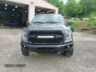 2015 Ford F-150 XLT with VIN 1FTFX1EG0FFD05618, listed as a Copart auction lot 61289795 with 91,836 mi miles and Salvage title. Bid and sale history available at DreamBid. Image 13.