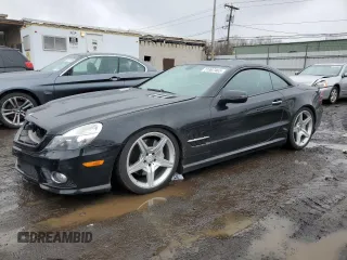 2011 Mercedes-Benz SL 550 z VIN WDBSK7BA8BF165312, wystawiony jako Copart lot #51907465 z przebiegiem 32 057 mil mil oraz Szkoda całkowita • Salvage title. Historia ofert i sprzedaży dostępna na DreamBid. Obrazek 1.