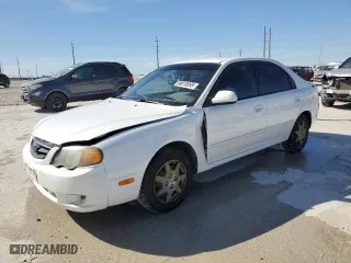 2002 Kia Spectra GS with VIN KNAFB161725077686, listed as a Copart auction lot 48618095 with NaN miles and Salvage Title. Bid and sale history available at carsss.com. Image 1.
