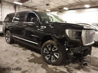 2021 GMC Yukon XL Denali with VIN 1GKS2JKL3MR149850, listed as a IAAI auction lot 41588274 with 77,181 mi miles. Bid and sale history available at carsss.com. Image 1.