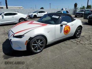 2021 Mazda MX-5 Miata Grand Touring with VIN JM1NDAD77M0459510, listed as a Copart auction lot 68654874 with 39,657 mi miles and Salvage title. Bid and sale history available at DreamBid. Image 1.