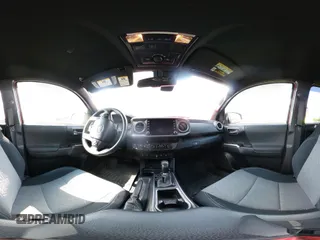 2021 Toyota Tacoma SR z VIN 5TFCZ5AN2MX263159, wystawiony jako IAAI lot #42273087 z przebiegiem 69 220 mil mil oraz . Historia ofert i sprzedaży dostępna na DreamBid. Obrazek 17.