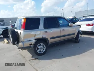 2000 Honda CR-V SE with VIN JHLRD1873YC039813, listed as a IAAI auction lot 40716079 with 214,067 mi miles. Bid and sale history available at carsss.com. Image 4.