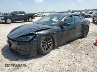 2023 Tesla Model S Plaid with VIN 5YJSA1E62PF511875, listed as a Copart auction lot 65583824 with Not provided miles and Salvage title. Bid and sale history available at DreamBid. Image 1.