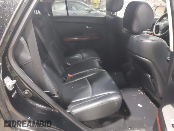 2004 Lexus RX with VIN 2T2HA31U74C036035, listed as a IAAI auction lot 42195070 with 200,689 mi miles. Bid and sale history available at carsss.com. Image 8.