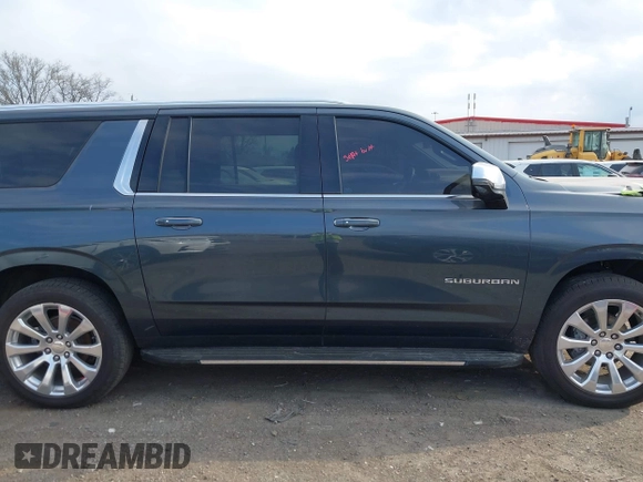 2021 Chevrolet Suburban Premier with VIN 1GNSKFKDXMR295929, listed as a IAAI auction lot 42033006 with 46,733 mi miles and . Bid and sale history available at DreamBid. Image 13.
