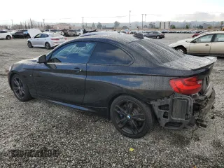 2014 BMW 2 Series M235i with VIN WBA1J7C55EVW84665, listed as a Copart auction lot 44257115 with 111,461 mi miles and Salvage title. Bid and sale history available at DreamBid. Image 2.