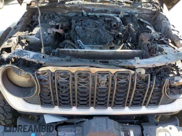2024 Jeep Wrangler Rubicon X с VIN 1C4RJXR62RW167216, выставлен на аукционе Copart как лот 49034325 с пробегом Не указан миль и Списание • Salvage title. История ставок и продаж доступна на DreamBid. Изображение 12.
