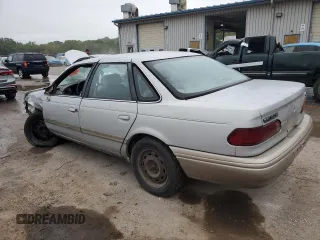 1994 Ford Taurus GL z VIN 1FALP52U0RA251491, wystawiony jako Copart lot #71640224 z przebiegiem Nie podano mil oraz Szkoda całkowita • Salvage title. Historia ofert i sprzedaży dostępna na DreamBid. Obrazek 2.