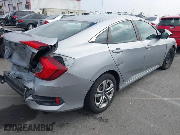 2017 Honda Civic LX with VIN 2HGFC2F5XHH562089, listed as a IAAI auction lot 42010207 with 99,809 mi miles and . Bid and sale history available at DreamBid. Image 4.