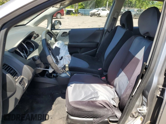 2007 Honda Fit Sport with VIN JHMGD38677S054938, listed as a Copart auction lot 63080704 with 155,754 mi miles and Salvage Title. Bid and sale history available at carsss.com. Image 7.