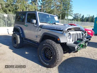 2018 Jeep Wrangler Sport S with VIN 1C4GJWAGXJL923886, listed as a IAAI auction lot 42712359 with 68,234 mi miles and . Bid and sale history available at DreamBid. Image 1.