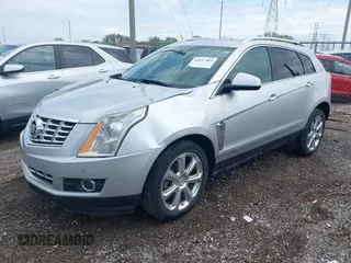 2013 Cadillac SRX Performance Collection z VIN 3GYFNDE35DS636363, wystawiony jako IAAI lot #42147483 z przebiegiem 116 894 mil mil oraz . Historia ofert i sprzedaży dostępna na DreamBid. Obrazek 2.