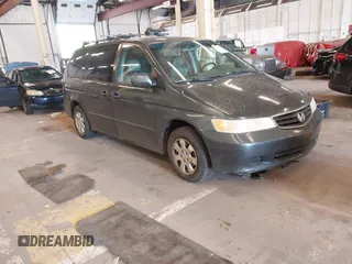 2003 Honda Odyssey EX-L with VIN 5FNRL18013B027920, listed as a IAAI auction lot 42154012 with 145,384 mi miles and . Bid and sale history available at DreamBid. Image 1.