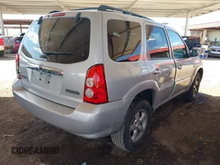 2005 Mazda Tribute S with VIN 4F2YZ06155KM61960, listed as a IAAI auction lot 42069266 with 192,284 mi miles and . Bid and sale history available at carsss.com. Image 4.