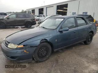 2002 Saturn LS z VIN 1G8JU54F72Y581967, wystawiony jako Copart lot #74521994 z przebiegiem 215 018 mil mil oraz Szkody całkowita. Historia ofert i sprzedaży dostępna na DreamBid. Obrazek 1.