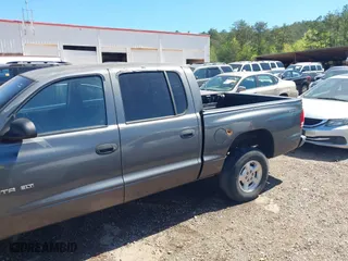2002 Dodge Dakota SLT with VIN 1B7HG48NX2S623588, listed as a IAAI auction lot 41793068 with 213,159 mi miles. Bid and sale history available at carsss.com. Image 6.