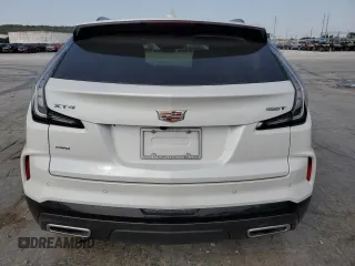 2024 Cadillac XT4 AWD Sport с VIN 1GYFZFR47RF125557, выставлен на аукционе Copart как лот 70869104 с пробегом 8 714 миль миль и Списание • Salvage title. История ставок и продаж доступна на DreamBid. Изображение 6.