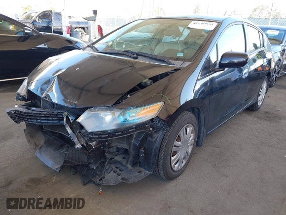 2010 Honda Insight LX with VIN JHMZE2H54AS021815, listed as a IAAI auction lot 42259951 with 137,436 mi miles and . Bid and sale history available at DreamBid. Image 2.