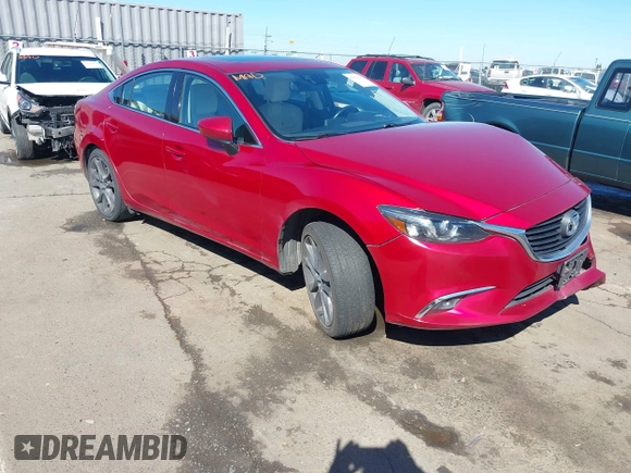 2016 Mazda 6 i Grand Touring с VIN JM1GJ1W50G1430328, выставлен на аукционе IAAI как лот 41879262 с пробегом 122 545 миль миль и . История ставок и продаж доступна на DreamBid. Изображение 1.