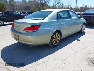 2007 Toyota Avalon XL with VIN 4T1BK36B27U177466, listed as a IAAI auction lot 42006940 with 202,095 mi miles. Bid and sale history available at carsss.com. Image 4.