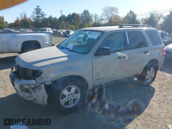 2008 Ford Escape XLT with VIN 1FMCU93158KA39754, listed as a IAAI auction lot 40660179 with 113,956 mi miles. Bid and sale history available at carsss.com. Image 2.