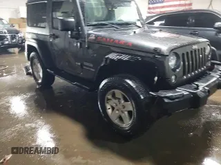 2018 Jeep Wrangler Sport S z VIN 1C4GJWAG5JL851446, wystawiony jako Copart lot #47296905 z przebiegiem 63 043 mil mil oraz Szkoda całkowita • Salvage title. Historia ofert i sprzedaży dostępna na DreamBid. Obrazek 13.