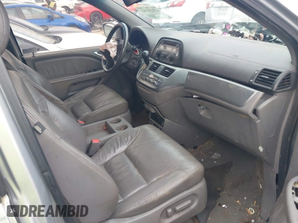 2010 Honda Odyssey EX-L z VIN 5FNRL3H78AB036216, wystawiony jako IAAI lot #42115792 z przebiegiem 234 057 mil mil oraz . Historia ofert i sprzedaży dostępna na DreamBid. Obrazek 5.