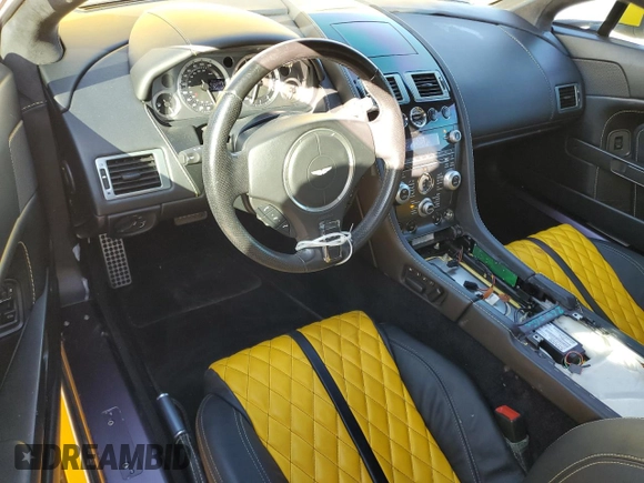 2009 Aston Martin Vantage z VIN SCFBF04C79GD12188, wystawiony jako Copart lot #45348405 z przebiegiem 29 580 mil mil oraz Szkoda całkowita • Salvage title. Historia ofert i sprzedaży dostępna na DreamBid. Obrazek 8.