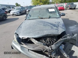 2004 Cadillac DeVille DHS z VIN 1G6KE57Y74U119605, wystawiony jako IAAI lot #40555057 z przebiegiem Nie podano mil oraz . Historia ofert i sprzedaży dostępna na DreamBid. Obrazek 12.