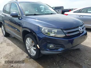2012 Volkswagen Tiguan S with VIN WVGBV7AX3CW571039, listed as a IAAI auction lot 41928361 with 165,938 mi miles and . Bid and sale history available at DreamBid. Image 1.