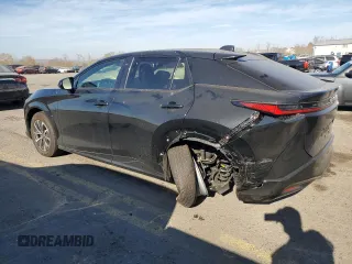 2024 Lexus RZ 300e Premium z VIN JTJABABBXRA001776, wystawiony jako Copart lot #76914814 z przebiegiem 1391 mil mil oraz Szkody całkowita. Historia ofert i sprzedaży dostępna na DreamBid. Obrazek 2.