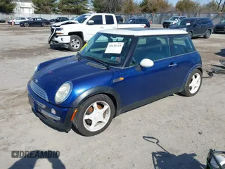 2002 MINI Hardtop with VIN WMWRC33482TC36492, listed as a IAAI auction lot 41633112 with 133,672 mi miles and . Bid and sale history available at DreamBid. Image 21.