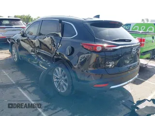 2021 Mazda CX-9 Carbon Edition with VIN JM3TCBDY3M0524241, listed as a IAAI auction lot 42538127 with 50,533 mi miles and . Bid and sale history available at DreamBid. Image 3.