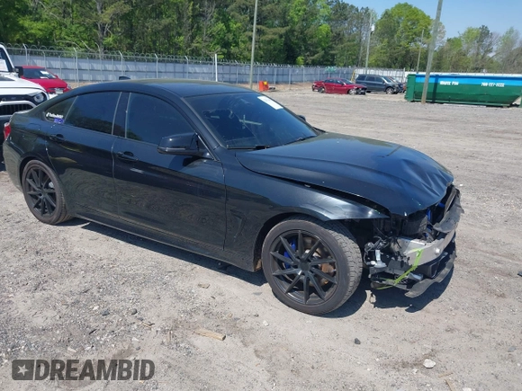 2019 BMW 4 Series 430i with VIN WBA4J1C59KBM17309, listed as a IAAI auction lot 42011443 with 87,189 mi miles. Bid and sale history available at carsss.com. Image 1.