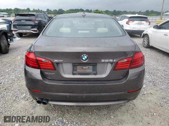 2013 BMW 5 Series 528i xDrive with VIN WBAXH5C56DD113944, listed as a Copart auction lot 60683665 with 15,187 mi miles and Salvage title. Bid and sale history available at DreamBid. Image 6.