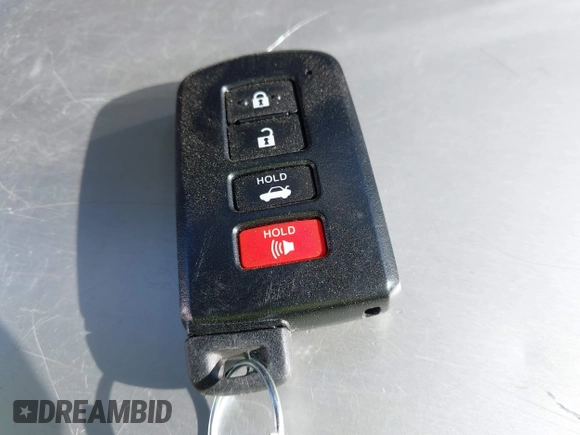 2019 Toyota Corolla L with VIN 5YFBURHE7KP922064, listed as a IAAI auction lot 41977741 with 54,896 mi miles and . Bid and sale history available at DreamBid. Image 11.