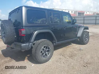 2024 Jeep Wrangler Rubicon with VIN 1C4PJXFG0RW271322, listed as a IAAI auction lot 42736647 with 32,319 mi miles and . Bid and sale history available at DreamBid. Image 4.