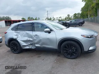2023 Mazda CX-9 Touring Plus with VIN JM3TCBAY7P0652913, listed as a IAAI auction lot 42186917 with 20,649 mi miles and . Bid and sale history available at DreamBid. Image 6.