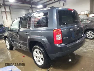 2014 Jeep Patriot Latitude with VIN 1C4NJRFB0ED588336, listed as a Copart auction lot 89391695 with 133,941 mi miles and Salvage Title. Bid and sale history available at carsss.com. Image 2.