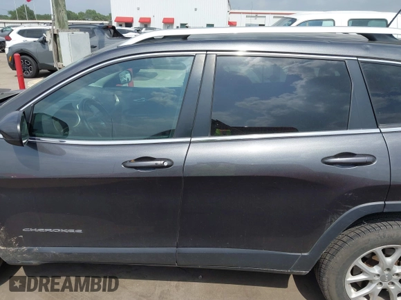 2015 Jeep Cherokee Latitude z VIN 1C4PJMCS2FW601271, wystawiony jako IAAI lot #41969742 z przebiegiem 94 224 mil mil oraz . Historia ofert i sprzedaży dostępna na DreamBid. Obrazek 14.