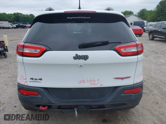 2014 Jeep Cherokee Trailhawk z VIN 1C4PJMBS4EW210719, wystawiony jako IAAI lot #42461733 z przebiegiem 134 096 mil mil oraz . Historia ofert i sprzedaży dostępna na DreamBid. Obrazek 16.