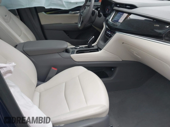 2023 Cadillac XT6 AWD Premium Luxury with VIN 1GYKPDRS2PZ126666, listed as a IAAI auction lot 40963833 with 23,535 mi miles and . Bid and sale history available at DreamBid. Image 5.