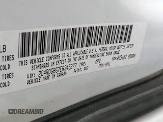 2014 Dodge Grand Caravan American Value with VIN 2C4RDGBG7ER345277, listed as a IAAI auction lot 42061355 with 145,889 mi miles and . Bid and sale history available at DreamBid. Image 9.