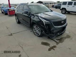 2020 Cadillac XT4 FWD Sport z VIN 1GYFZER47LF146488, wystawiony jako Copart lot #53174175 z przebiegiem 66 820 mil mil oraz Szkoda całkowita • Salvage title. Historia ofert i sprzedaży dostępna na DreamBid. Obrazek 14.