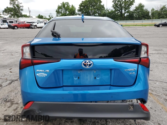 2021 Toyota Prius L Eco with VIN JTDKAMFU1M3146516, listed as a Copart auction lot 58406175 with 19,911 mi miles and Salvage title. Bid and sale history available at DreamBid. Image 6.
