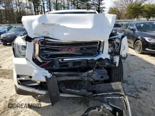2015 GMC Yukon SLT with VIN 1GKS2BKC4FR143581, listed as a Copart auction lot 50591645 with 0 mi miles and Salvage Title. Bid and sale history available at carsss.com. Image 5.