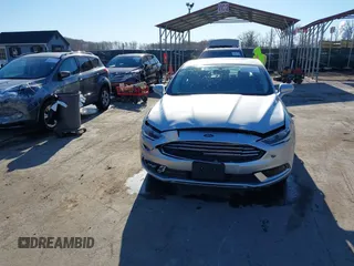 2018 Ford Fusion SE with VIN 3FA6P0LU1JR272522, listed as a IAAI auction lot 41796432 with 123,471 mi miles and . Bid and sale history available at DreamBid. Image 12.