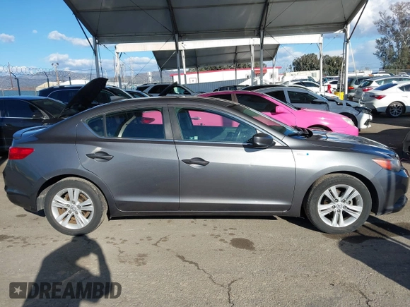 2013 Acura ILX Hybrid Technology z VIN 19VDE3F71DE300659, wystawiony jako IAAI lot #41754346 z przebiegiem 84 061 mil mil oraz . Historia ofert i sprzedaży dostępna na DreamBid. Obrazek 13.
